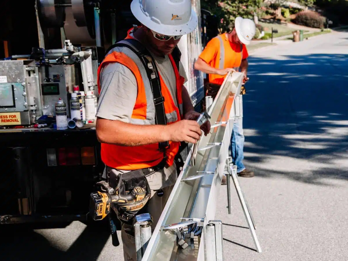 Gutter installation team at work